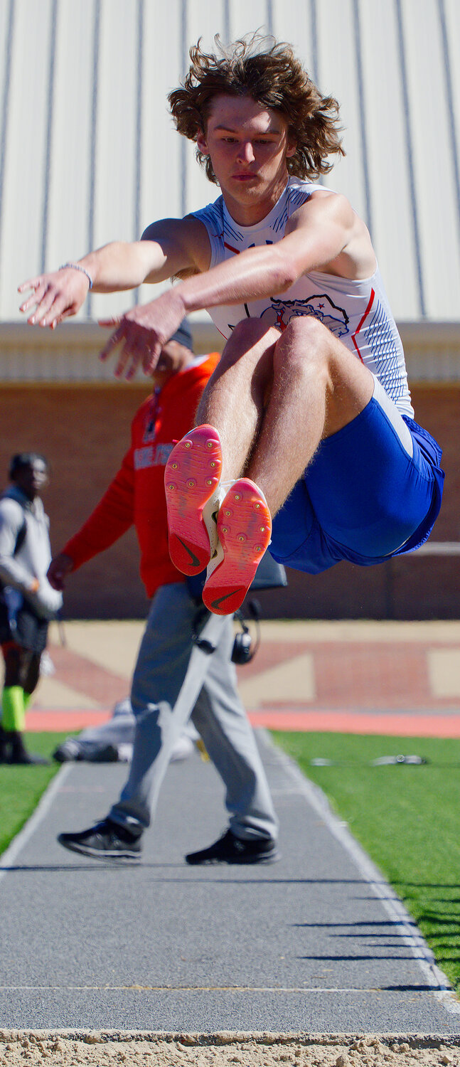Carter Smith of Quitman flew 20'7" for third place in the long jump. [see more speed and strength on display]